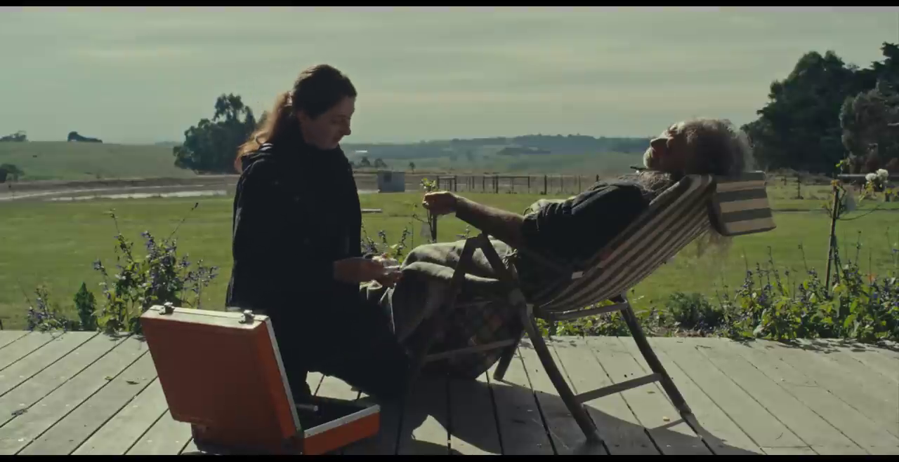 Marion preparing to give El an injection