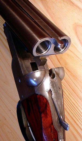 The open action of a Colt Model 1883 squid gun